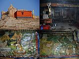 Mustang 02 10-5 Geiling Old Gompa I did trek farther up the hill and visited the older gompa above Geiling blackened by centuries of smoke from butter lamps. To the right of the altar is Mahakala. There are also a few old peeling paintings on the walls.